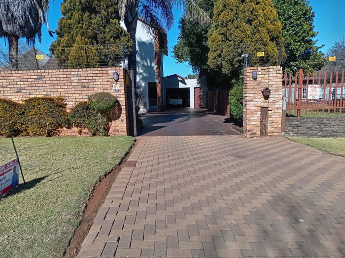 For Sale: 4-Bedroom House in Roodepoort West with Pool, Security, and Entertainment Area.