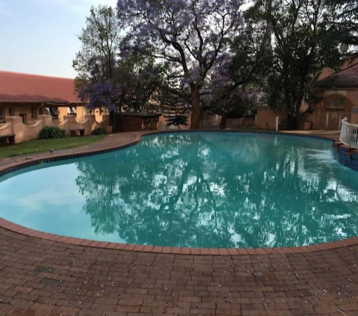 For Sale: Apartment in Randburg Central with 20 units, parking, and rental income.