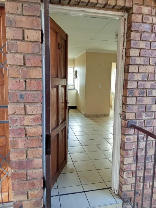 2-Bedroom Apartment For Sale in Duvha Park with secure parking and open-plan living.
