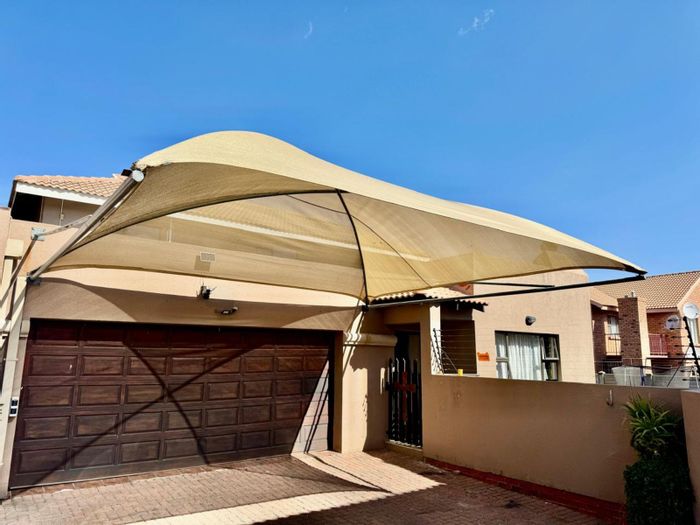 For Sale: Secunda Central House with 3 bedrooms, double garage, and water tanks.