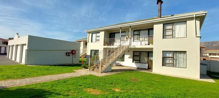 For Sale: Apartment in Whispering Pines with garage, pool, and 24-hour security.