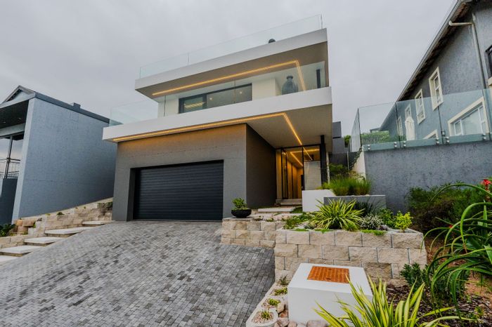 For Sale: House in Pinnacle Point Golf Estate with private lift and ocean views.