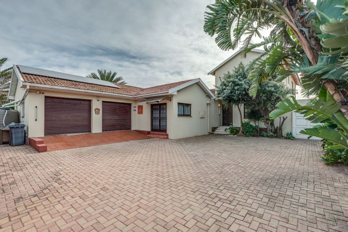 Spacious Bluewater Bay house with pool, office, and solar energy. For Sale.