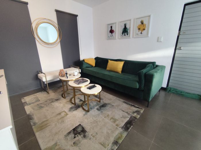 For Sale: Apartment in Honeydew Grove with balcony, braai, and parking options.