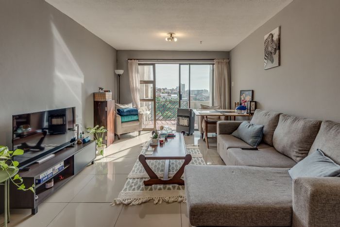 For Sale: 2-Bedroom Apartment in South End with Balcony, Bay Views, Pools.