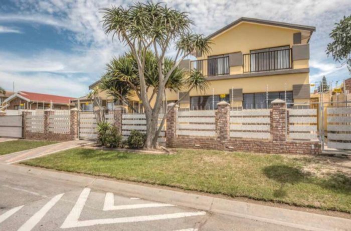 For Sale: Spacious Bluewater Bay house with pool, bar, and security features.