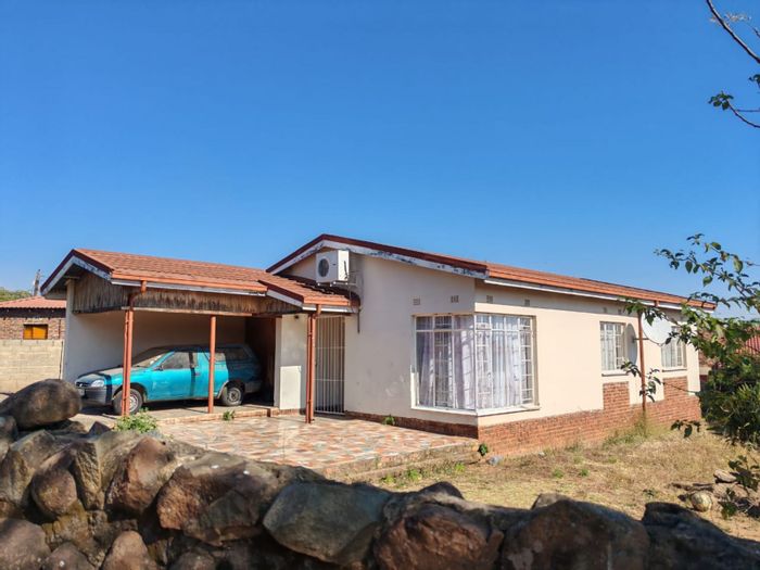 Barberton Central House For Sale: Spacious yard, pet-friendly, ideal for families.