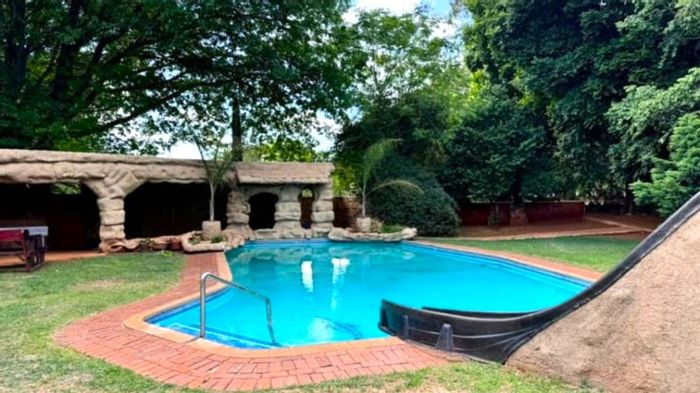 Versatile house for sale in Chancliff AH with income potential and extensive amenities.