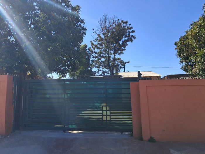 Phagameng House For Sale: 2 bedrooms, flatlet, carport, rental income potential.