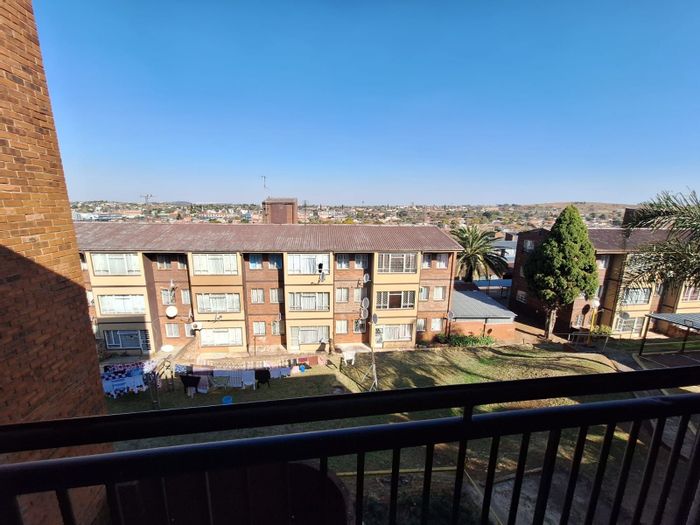 For Sale: 3-Bedroom Apartment in Laudium Ext 2, near schools, secure parking.