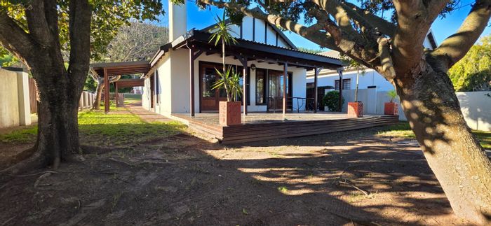 Charming house in The Village, 2 beds, patio, indoor braai, secure estate. For Sale.