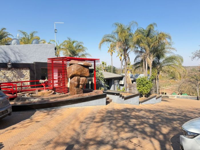 Dalmada AH Guest House For Sale: Expansive grounds, ideal for hospitality ventures.