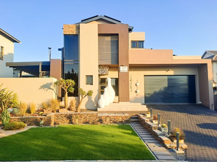 For Sale: Spacious Olympus AH house with pool, solar system, and staff quarters.