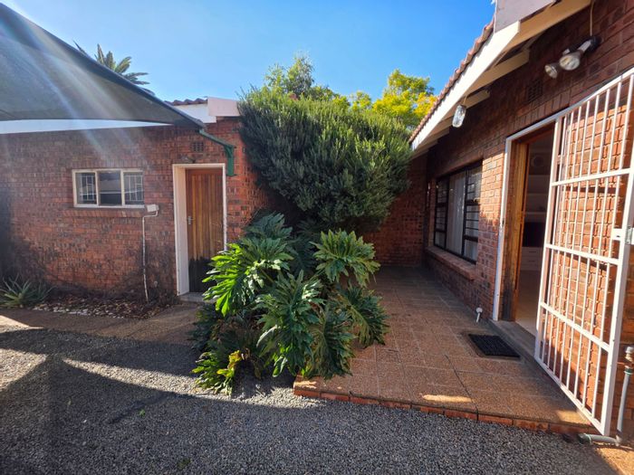 House for Sale in Memorial Road Area: 2 beds, garage, security features.