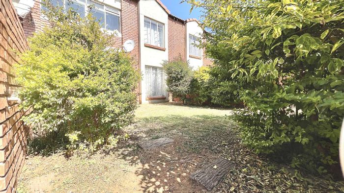 For Sale: Apartment in Mooikloof Ridge with private garden and secure amenities.
