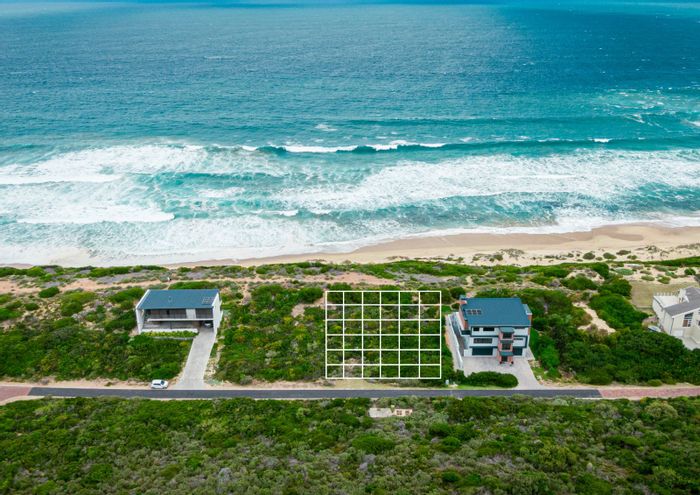 Vacant Land Residential in Moquini Coastal Estate For Sale, includes approved architectural plans.