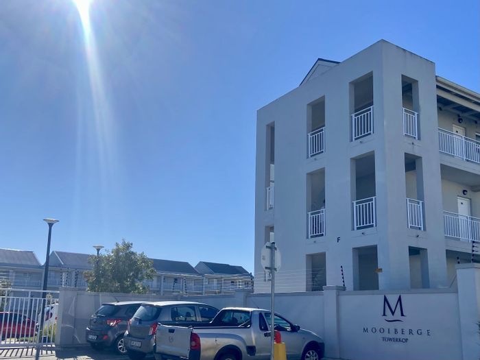 For Sale: 2-bedroom apartment in Haasendal, secure estate with parking and heat-pumps.