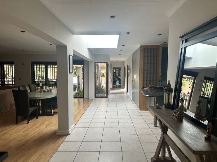 For Sale: House in Highlands North with cottage, pool, and spacious living areas.