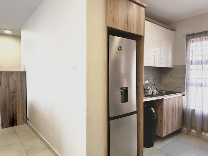 Lombardy Estate Apartment For Sale: 3 Bedrooms, Garden, Pool, and Play Areas.
