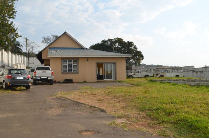Prime Office For Sale in Manors: High visibility, ample parking, flexible zoning.