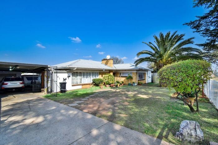 For Sale: House in Krugersdorp North with gardens, garage, and security features.