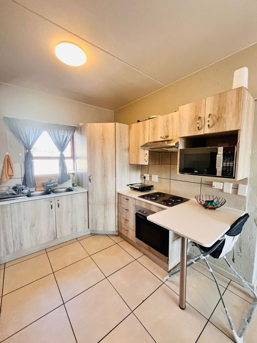 For Sale: 2-Bedroom Apartment in Douglasdale with Pools, Tennis Court, and Clubhouse.