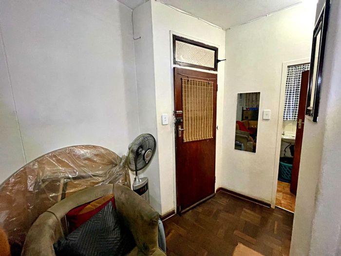 Bachelor apartment for sale in Pretoria Central with balcony and secure parking.