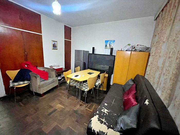 Bachelor apartment for sale in Pretoria Central with balcony and secure parking.