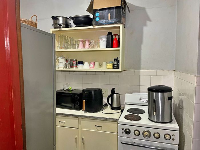 Sunnyside Apartment For Sale: Bachelor flat with secure parking, near transport and shops.