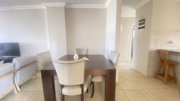 Warner Beach Apartment For Sale: 2-bed, sea views, secure parking, rental potential.