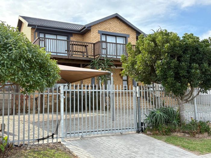 For Sale: Two houses in Dana Bay with ocean views and ample parking.