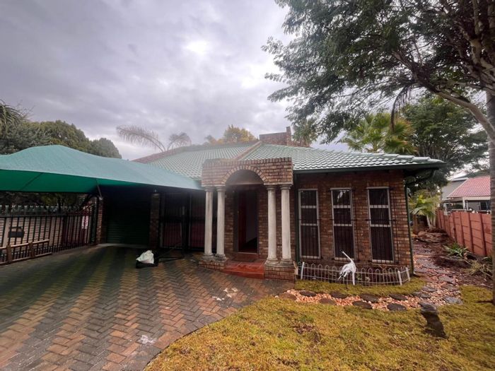 For Sale: 3-Bedroom Townhouse in Doornpoort with pool, garage, and expansive garden.