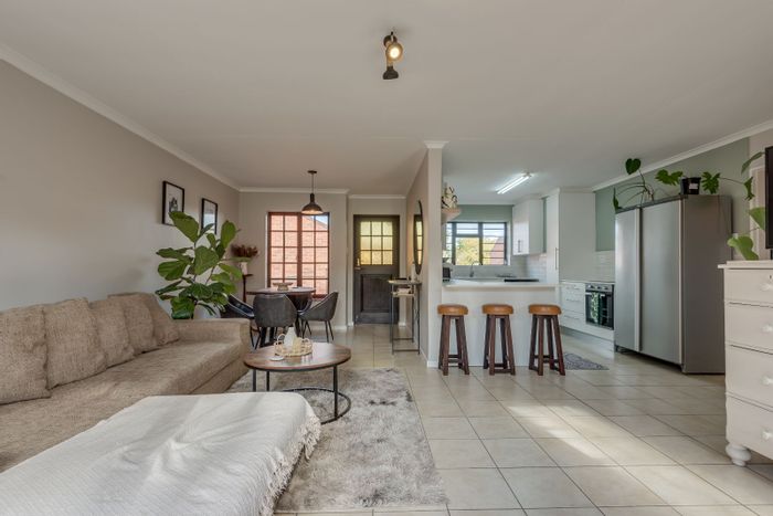 For Sale: Townhouse in Lovemore Park with gardens, garage, and secure living.