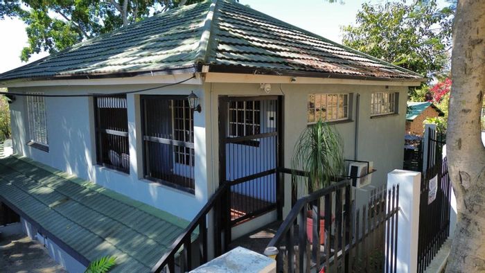 Numbipark House For Sale: Multiple units, pool, outdoor space, rental income potential.