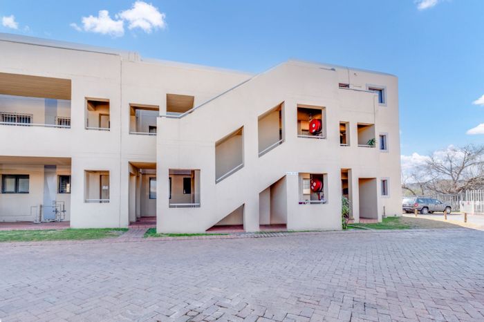 For Sale: Apartment in Weltevreden Park with communal pool, playground, and secure parking.