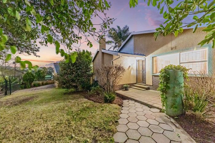 Honeyhills House For Sale: 5 bedrooms, spacious living areas, tranquil garden, versatile layout.