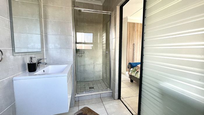For Sale: 2-Bedroom Apartment in Blyde Riverwalk Estate with lagoon, gym, and cinema.