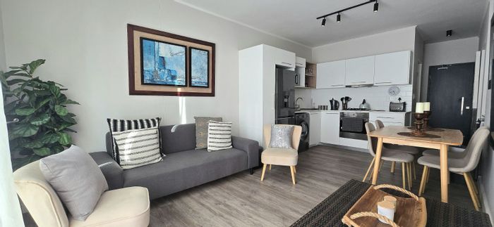 For Sale: Apartment in Mossel Bay Central with rooftop pool, balcony, and parking.