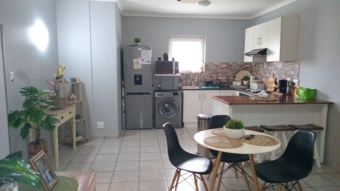 For Sale: 3-Bedroom Apartment in Paarl East with security, gardens, and parking.