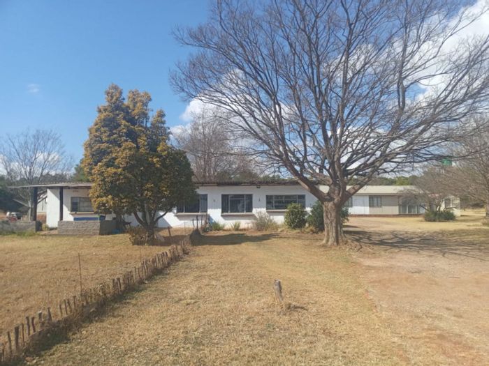 Farm for Sale in Bapsfontein: Multiple dwellings, borehole, income potential.
