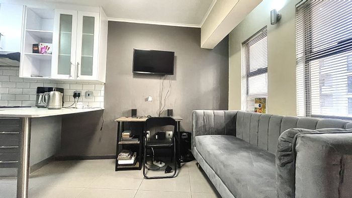 For Sale: Bachelor Apartment in Hatfield, near University, with private balcony and rental potential.