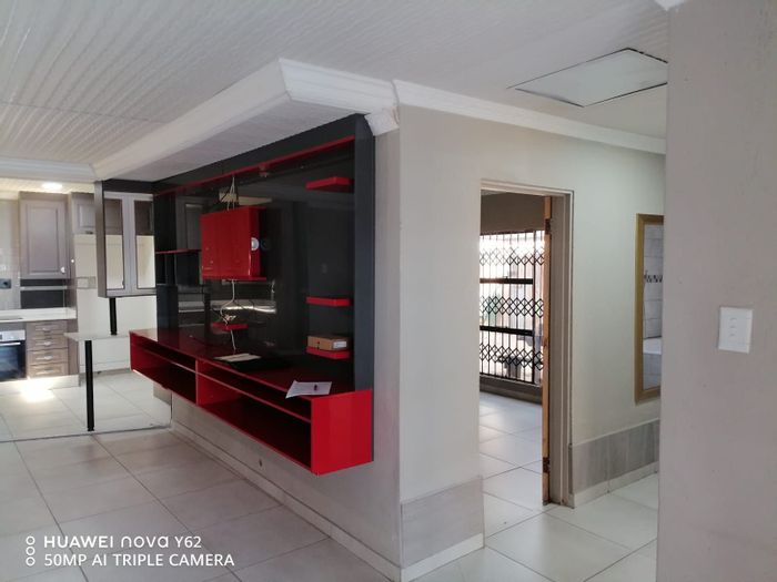 For Sale: House in Seshego 9L with 3 beds, carport, and built-in braai.