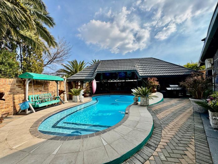 For Sale: Spacious 4-Bed House in Secunda Central with Pool, Flatlet, and Double Garage.