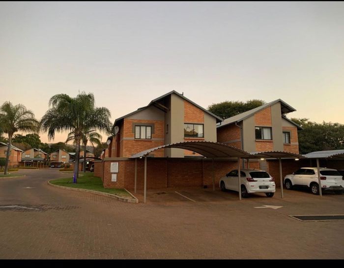 For Sale: Townhouse in Annlin with 2 beds, private garden, and secure parking.