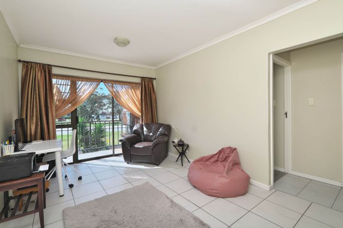 For Sale: Kabega Townhouse with 2 bedrooms, balcony, braai area, and secure parking.