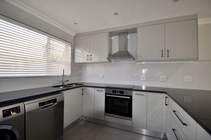 For Sale: House in Woodbridge Island with private garden, beach access, and pools.