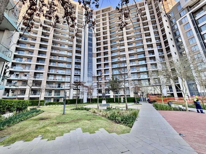 For Sale: Menlyn Apartment with balcony, secure parking, and lifestyle amenities.