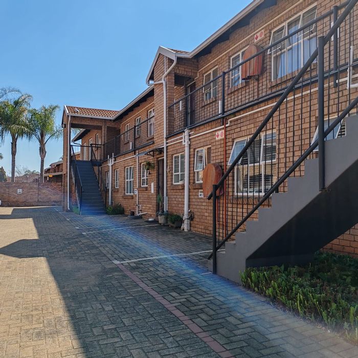 2-Bedroom Apartment For Sale in Hennopspark with Pool, Garage, and Balcony.