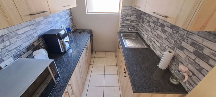 For Sale: Apartment in Gezina with 1.5 bedrooms, parking, and playground access.