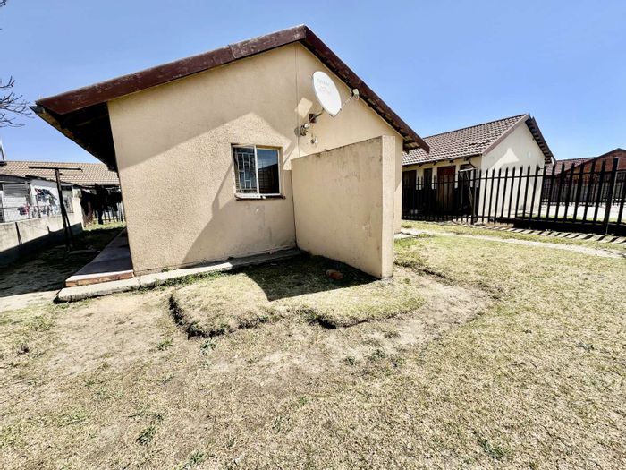 House for Sale in eMbalenhle: Close to mall, schools, secure parking, automated gate.